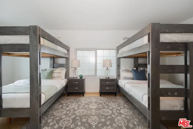 a bathroom with a shower and a toilet