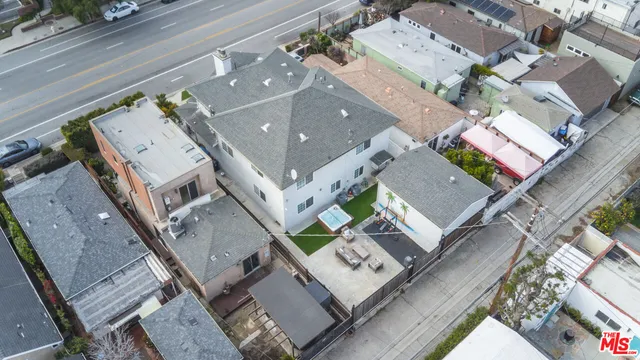a aerial view of a house with a garden and plants
