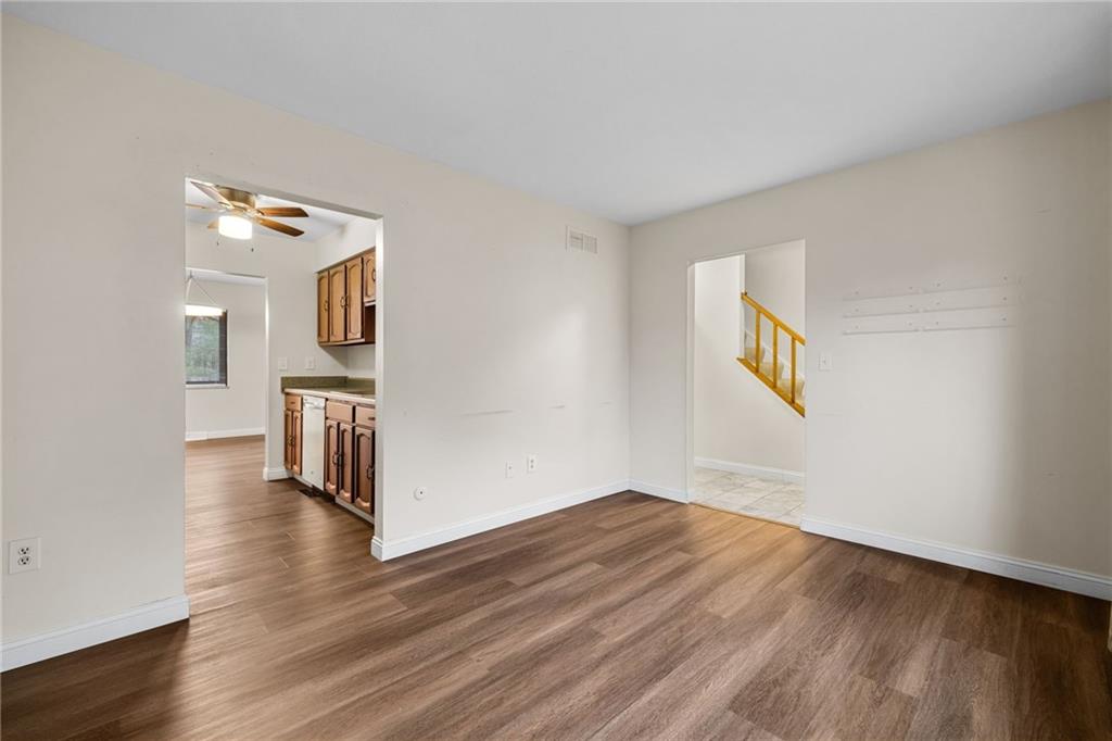 105 Springwater Court Coraopolis, PA 15108 - Photo 14 of 31 a view of a hallway with wooden floor and a bathroom