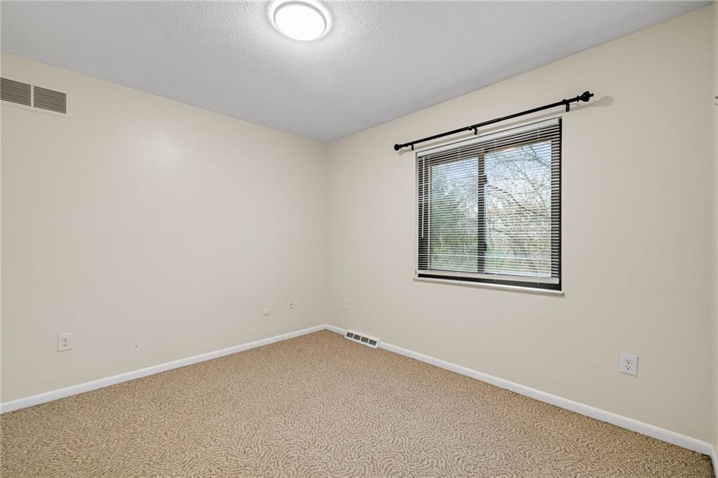 105 Springwater Court Coraopolis, PA 15108 - Photo 15 of 31 an empty room with a window