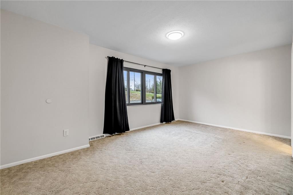 105 Springwater Court Coraopolis, PA 15108 - Photo 20 of 31 an empty room with windows