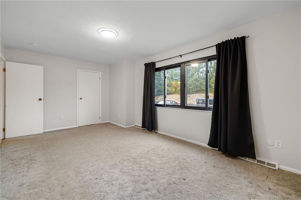 105 Springwater Court Coraopolis, PA 15108 - Photo 22 of 31 an empty room with windows