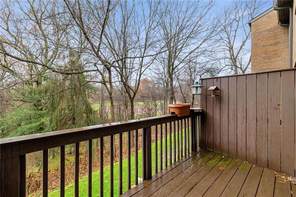 105 Springwater Court Coraopolis, PA 15108 - Photo 27 of 31 a view of a wooden balcony with trees