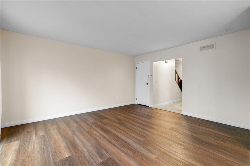 105 Springwater Court Coraopolis, PA 15108 - Photo 8 of 31 a view of an empty room with wooden floor