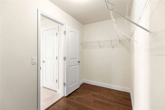 a bathroom with a double vanity sink and mirror