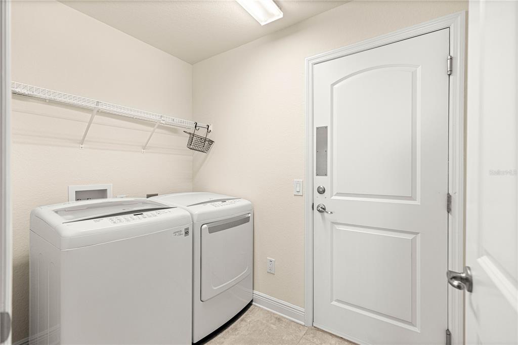 4401 Southwest 62nd Loop Ocala, FL 34474 - Photo 38 of 53 a utility room with dryer and washer