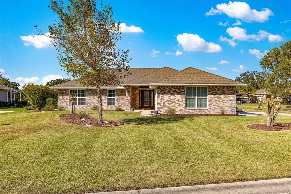 4401 Southwest 62nd Loop Ocala, FL 34474 - Photo 40 of 53 a front view of a house with swimming pool