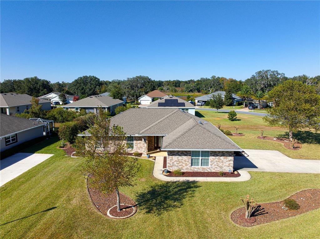 4401 Southwest 62nd Loop Ocala, FL 34474 - Photo 46 of 53 an aerial view of a house with yard swimming pool and outdoor seating