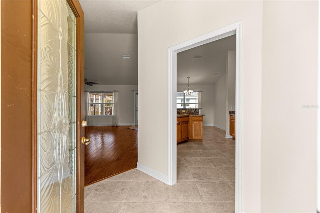 4401 Southwest 62nd Loop Ocala, FL 34474 - Photo 5 of 53 a view of a bathroom from the hallway