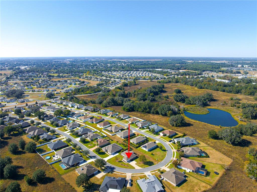 4401 Southwest 62nd Loop Ocala, FL 34474 - Photo 53 of 53 an aerial view of residential houses with outdoor space