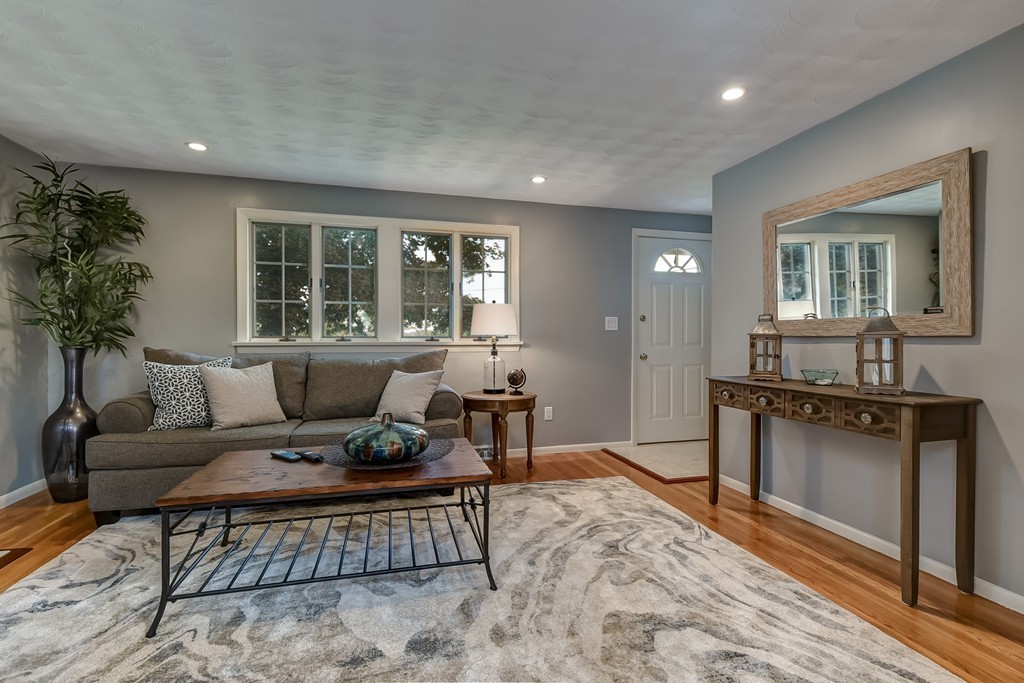 8 Jayne Road Needham, MA 02494 - Photo 6 of 24 a living room with furniture a window and a fireplace