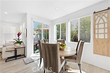 945 Sunlit Lane Costa Mesa, CA 92626 - Photo 10 of 31 a view of a dining room with furniture window and outside view