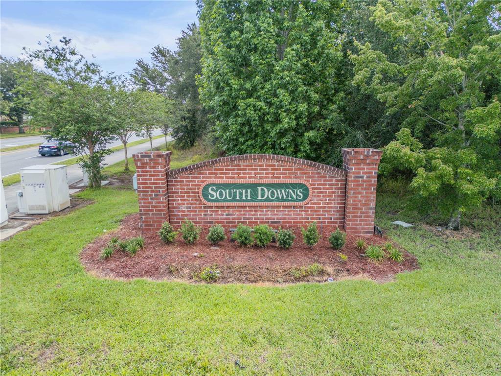 12232 Bronson Way Orlando, FL 32824 - Photo 28 of 32 a sign that is sitting in the grass