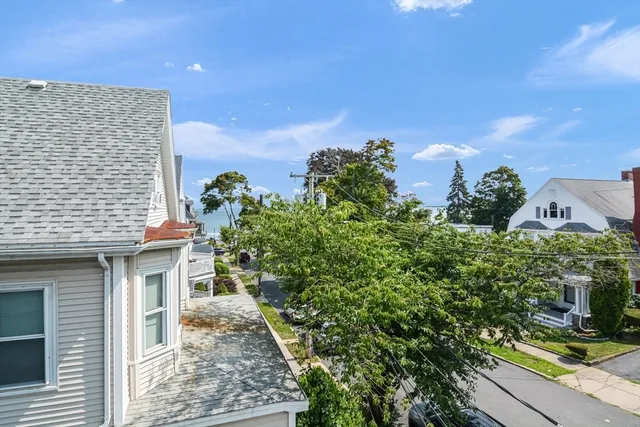a kitchen with a stove refrigerator and cabinets