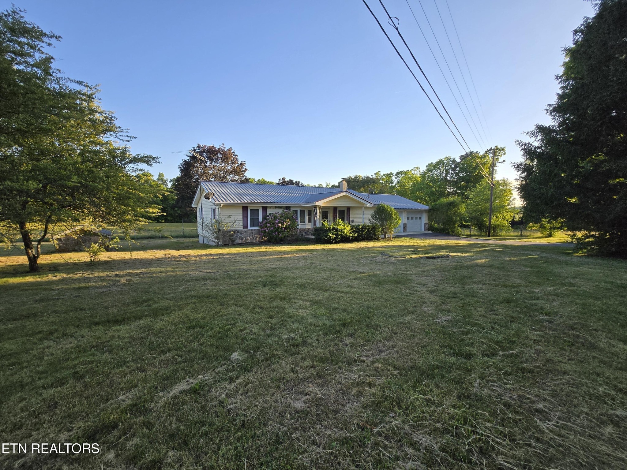 a view of a house with a big yard