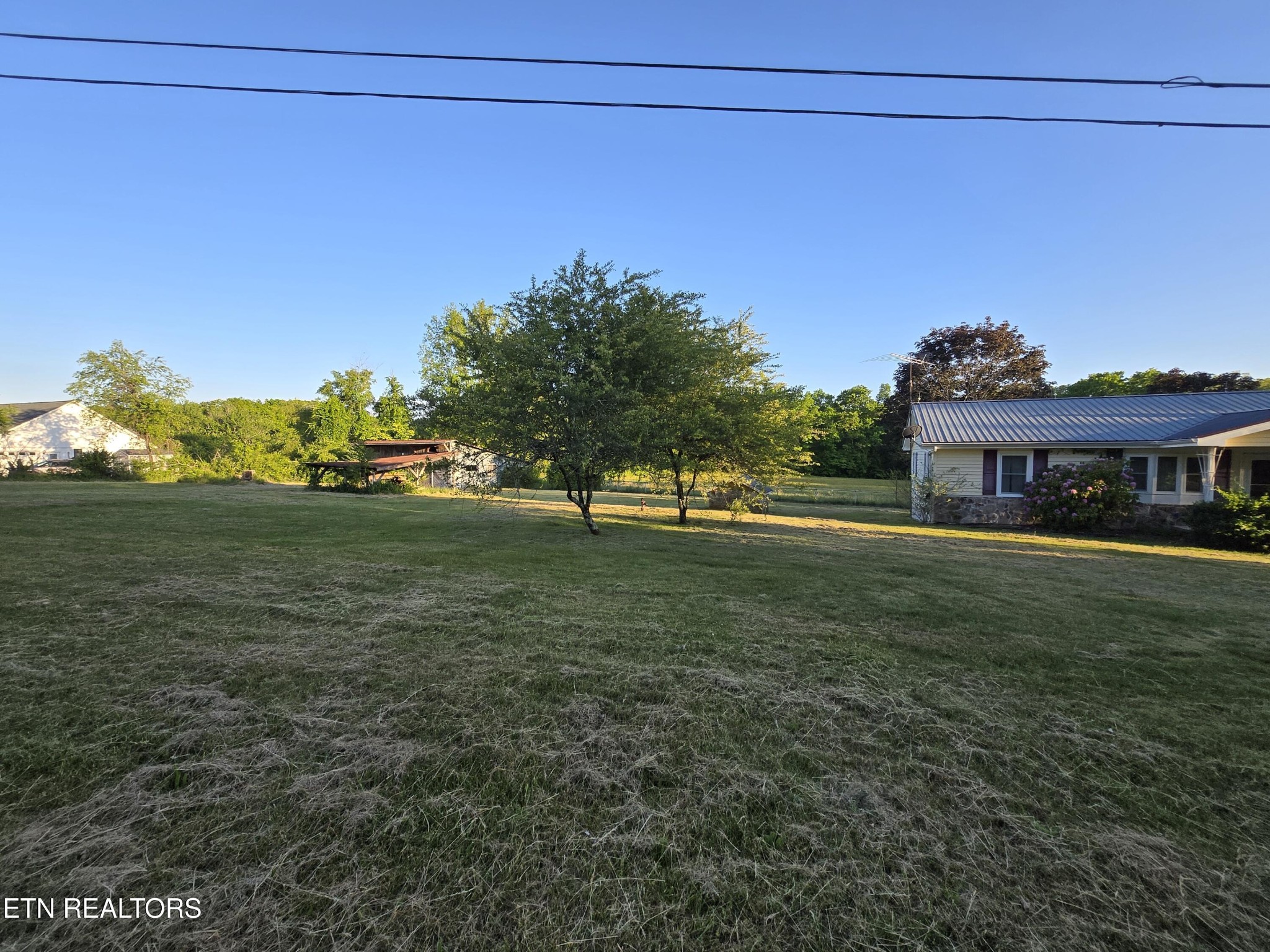 295 Bilbrey Road Crossville, TN 38571 - Photo 26 of 32 a view of a house with a yard