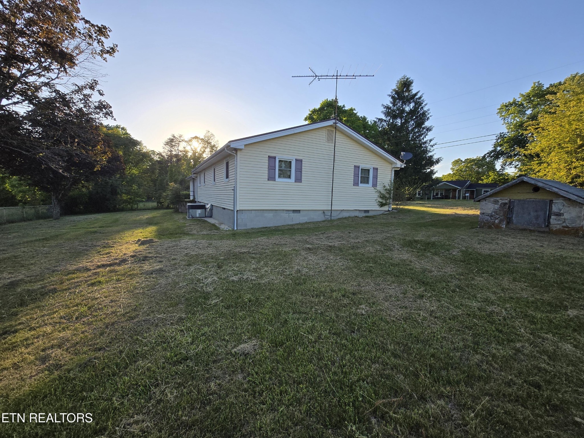 295 Bilbrey Road Crossville, TN 38571 - Photo 31 of 32 a view of a house with a yard