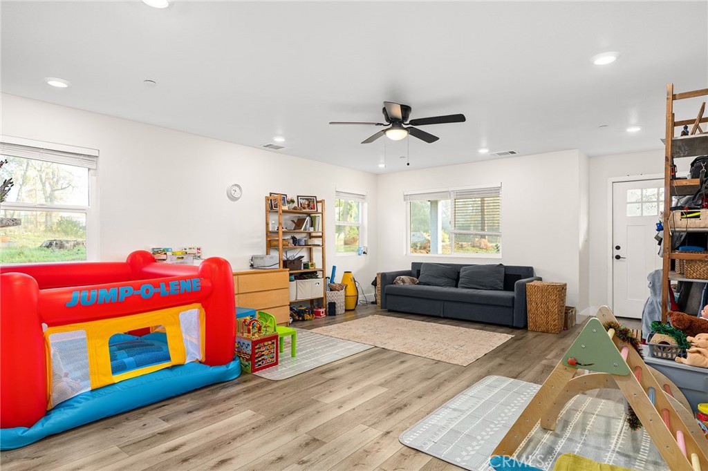 6033 Pentz Road Paradise, CA 95969 - Photo 15 of 54 a living room with furniture and a wooden floor