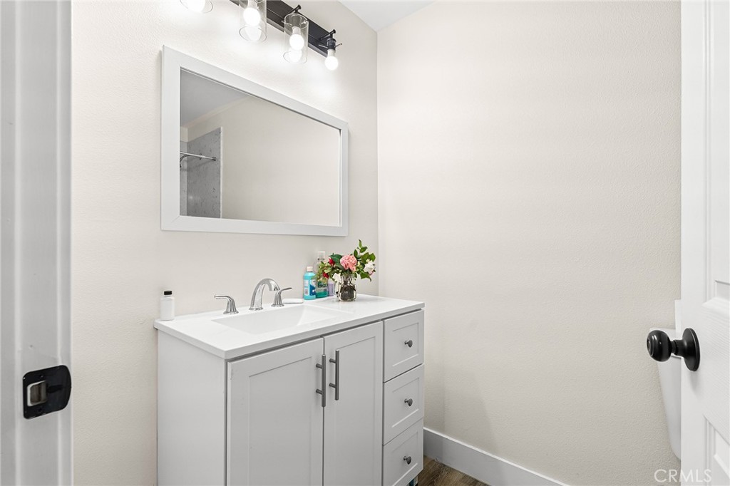 6033 Pentz Road Paradise, CA 95969 - Photo 36 of 54 a bathroom with a sink and a mirror