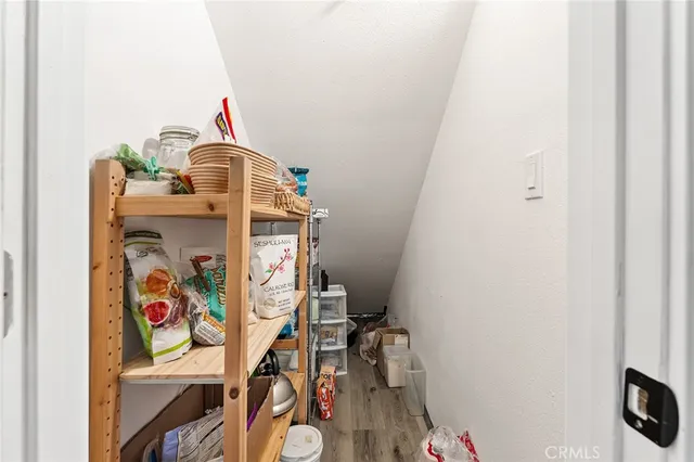 a view of a pathway of a house with a yard