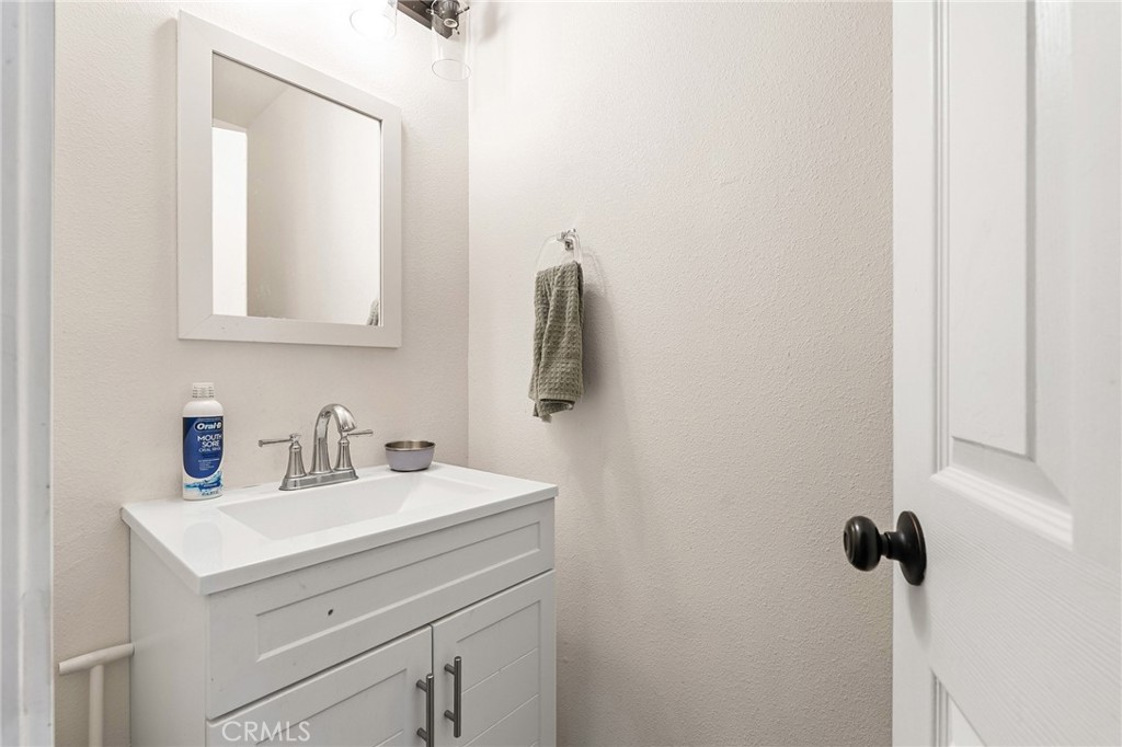 6033 Pentz Road Paradise, CA 95969 - Photo 43 of 54 a bathroom with a sink and a mirror