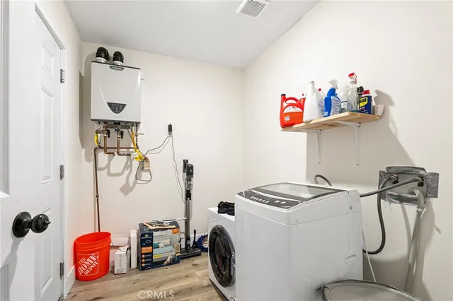 a view of swimming pool with outdoor seating
