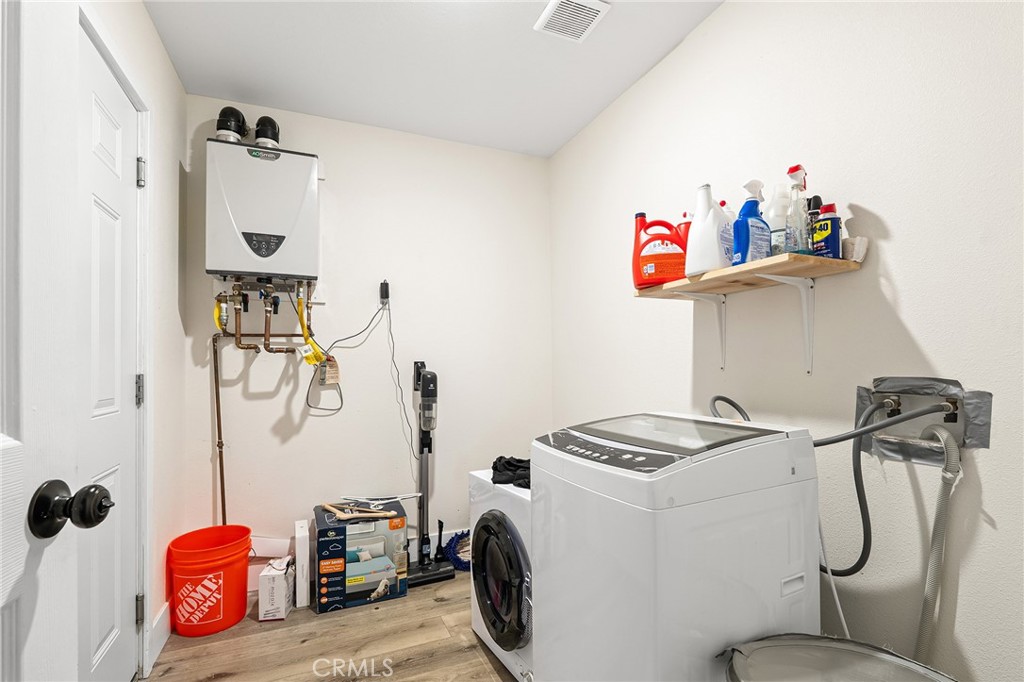 6033 Pentz Road Paradise, CA 95969 - Photo 45 of 54 a bathroom with a sink and a shower curtain