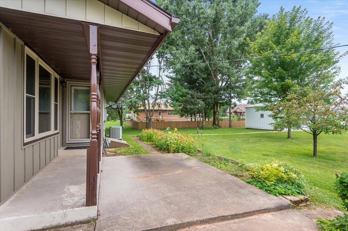 404 Alcohol Road Wrenshall, MN 55797 - Photo 28 of 32 View of patio with an outbuilding