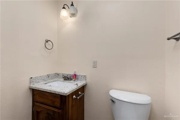 a bathroom with a sink and a toilet