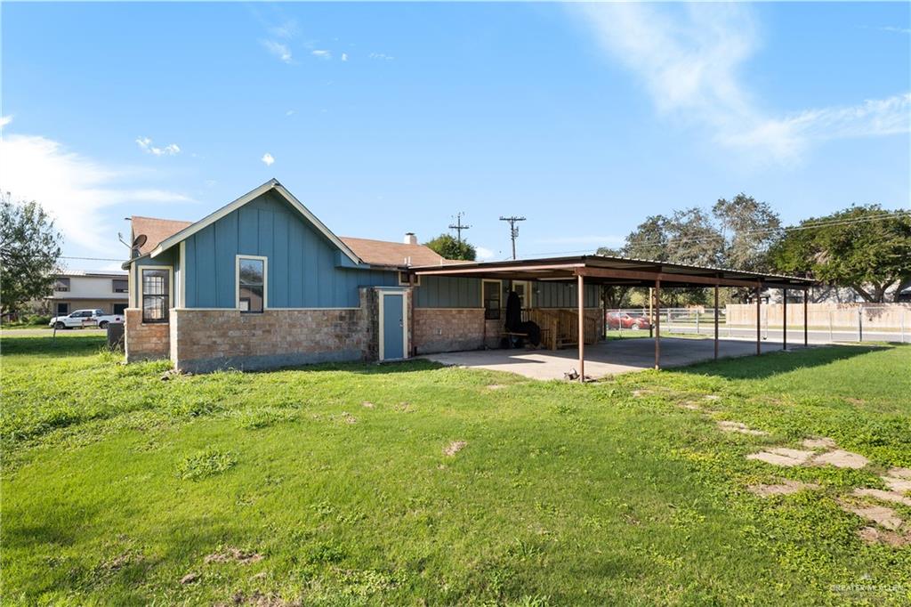 310 North Arroyo Boulevard Rio Hondo, TX 78583 - Photo 20 of 31 a view of a house with a backyard