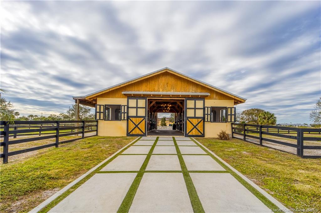 7625 Polo Square Vero Beach, FL 32968 - Photo 13 of 35 a view of house with swimming pool
