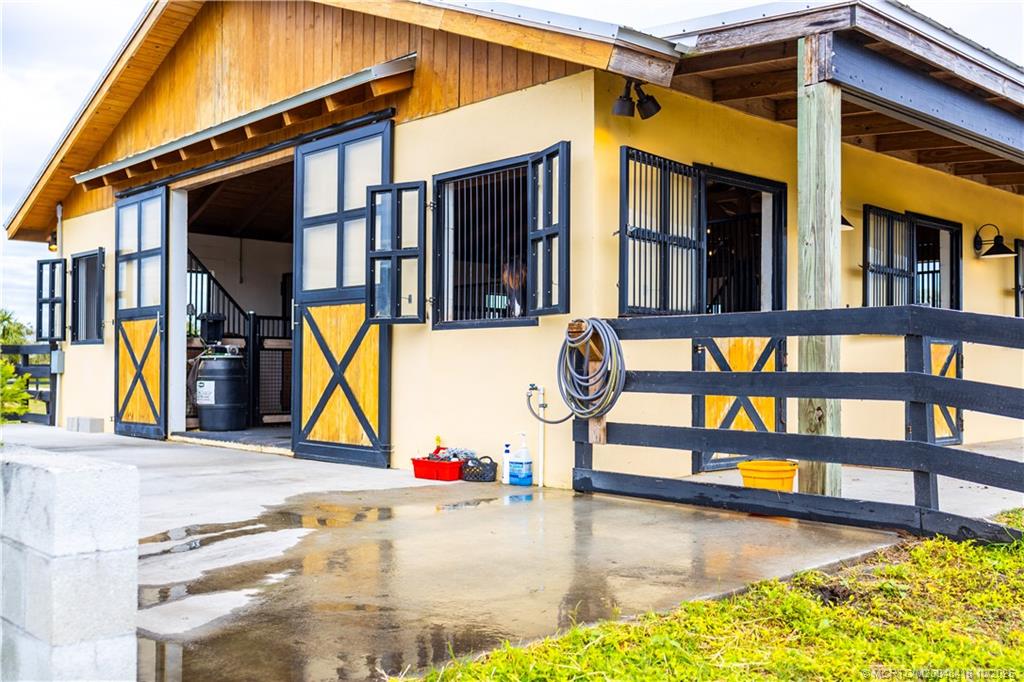 7625 Polo Square Vero Beach, FL 32968 - Photo 15 of 35 a view of building with swimming pool