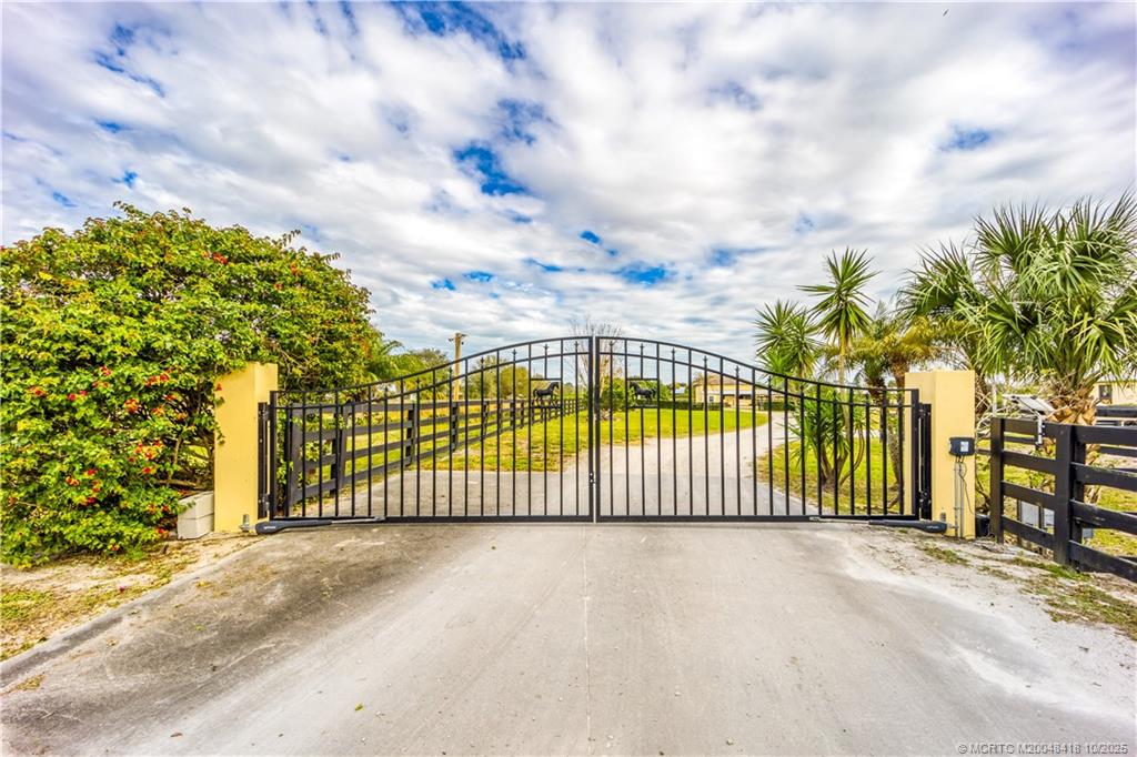 7625 Polo Square Vero Beach, FL 32968 - Photo 21 of 35 a view of a park with iron fence