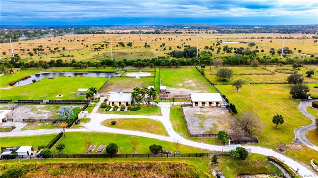 7625 Polo Square Vero Beach, FL 32968 - Photo 22 of 35 a view of a swimming pool with an ocean view