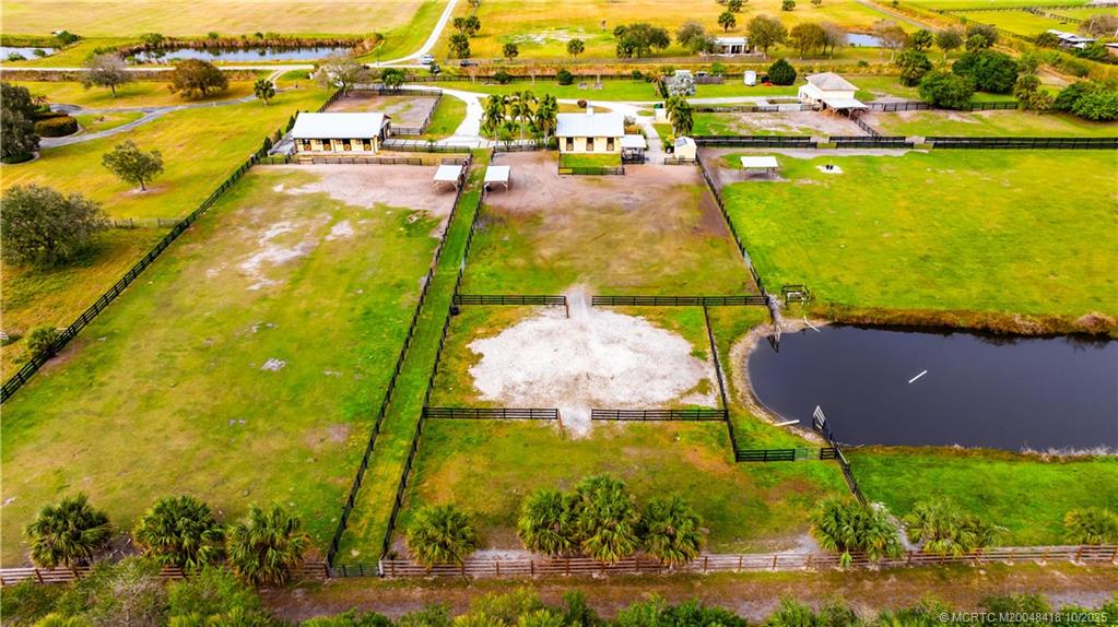 7625 Polo Square Vero Beach, FL 32968 - Photo 26 of 35 an aerial view of residential houses with outdoor space