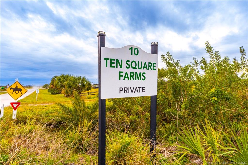 7625 Polo Square Vero Beach, FL 32968 - Photo 31 of 35 a sign that is on a brick wall