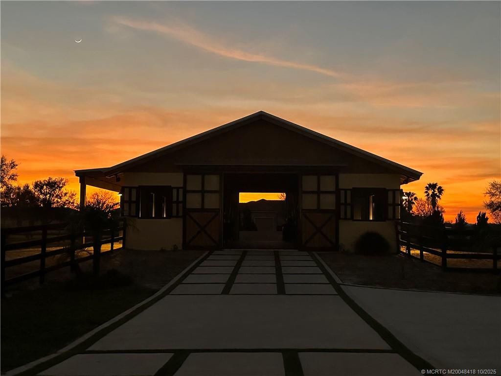 7625 Polo Square Vero Beach, FL 32968 - Photo 34 of 35 a black car parked in front of a house