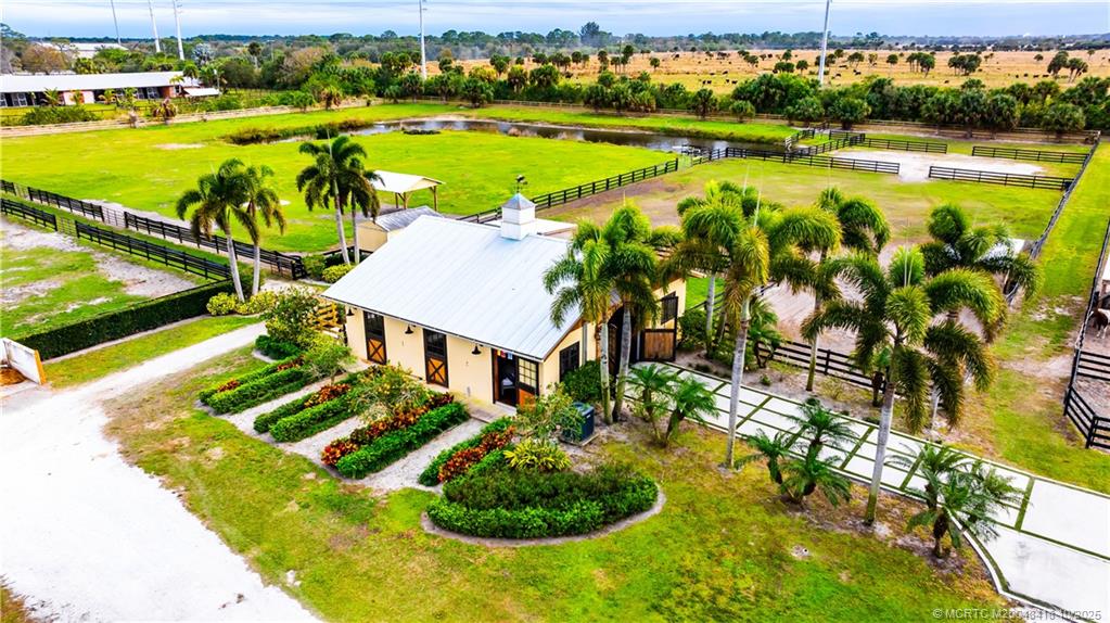 7625 Polo Square Vero Beach, FL 32968 - Photo 9 of 35 a view of an swimming pool and outdoor space