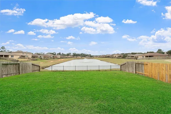 a view of a yard in front of house