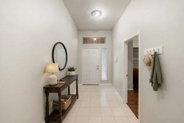 a view of living room kitchen with furniture and flat screen tv