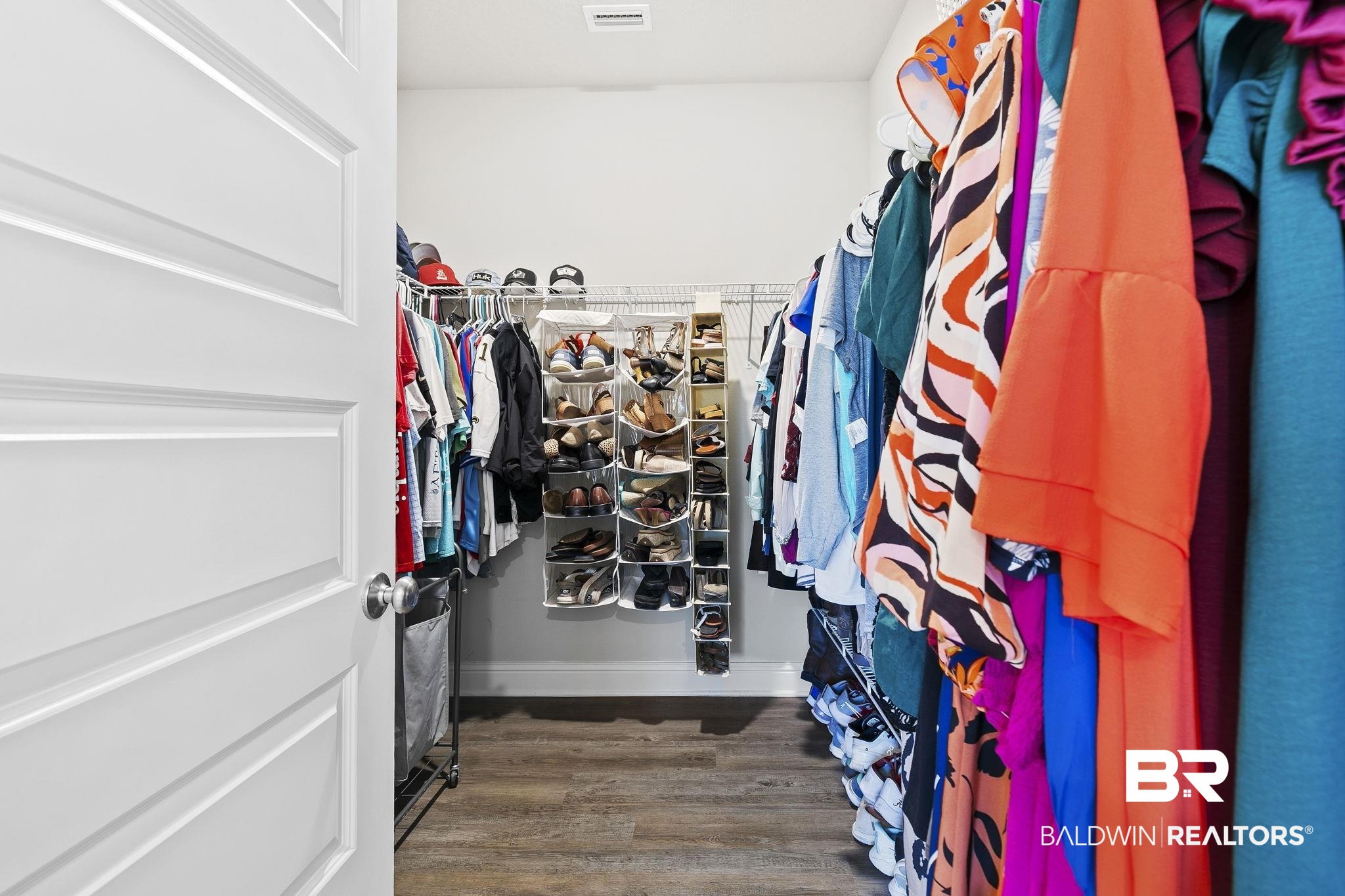 31610 Memphis Loop Daphne, AL 36527 - Photo 26 of 67 Walk in closet with visible vents and wood finished floors