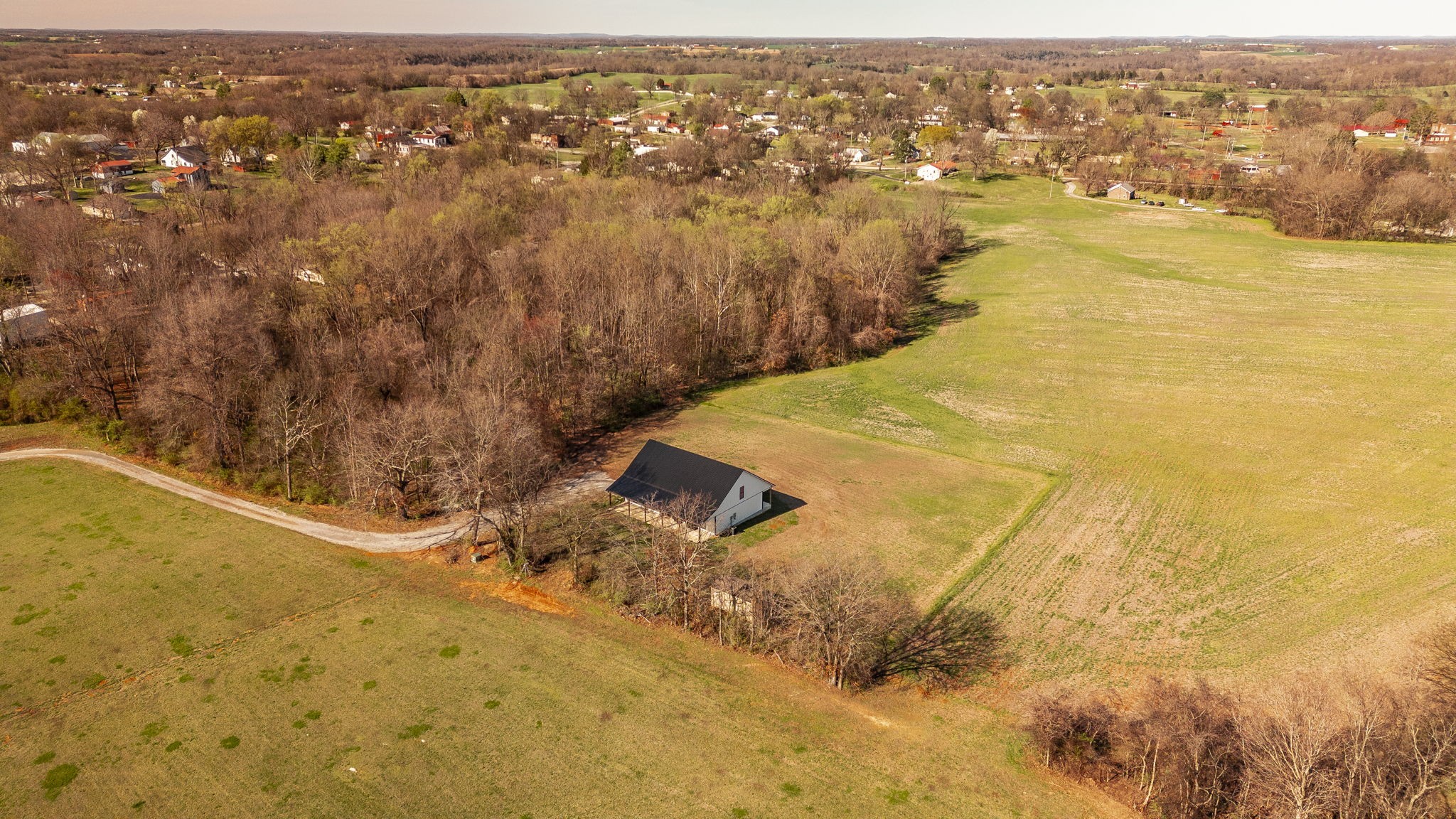 223 Cedar Hill Road Adams, TN 37010 - Photo 1 of 51 an aerial view of residential houses with outdoor space