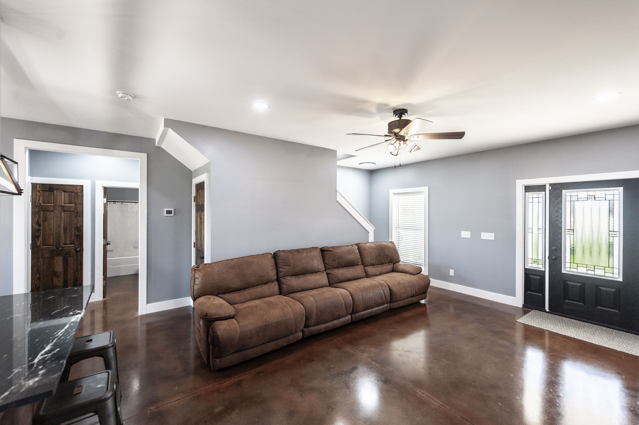 223 Cedar Hill Road Adams, TN 37010 - Photo 18 of 51 a living room with furniture and a chandelier