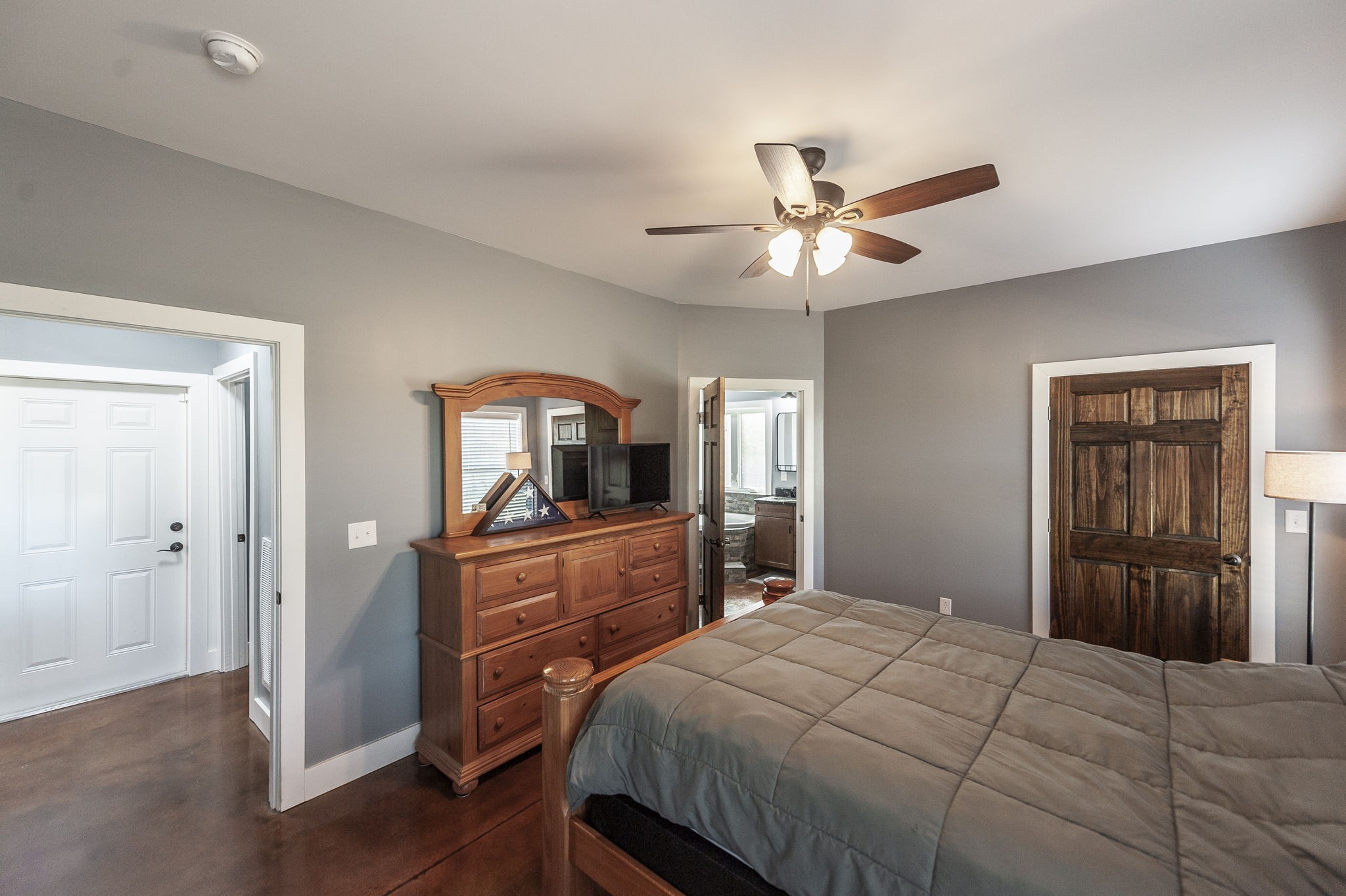 223 Cedar Hill Road Adams, TN 37010 - Photo 29 of 51 a bedroom with a bed and a dresser