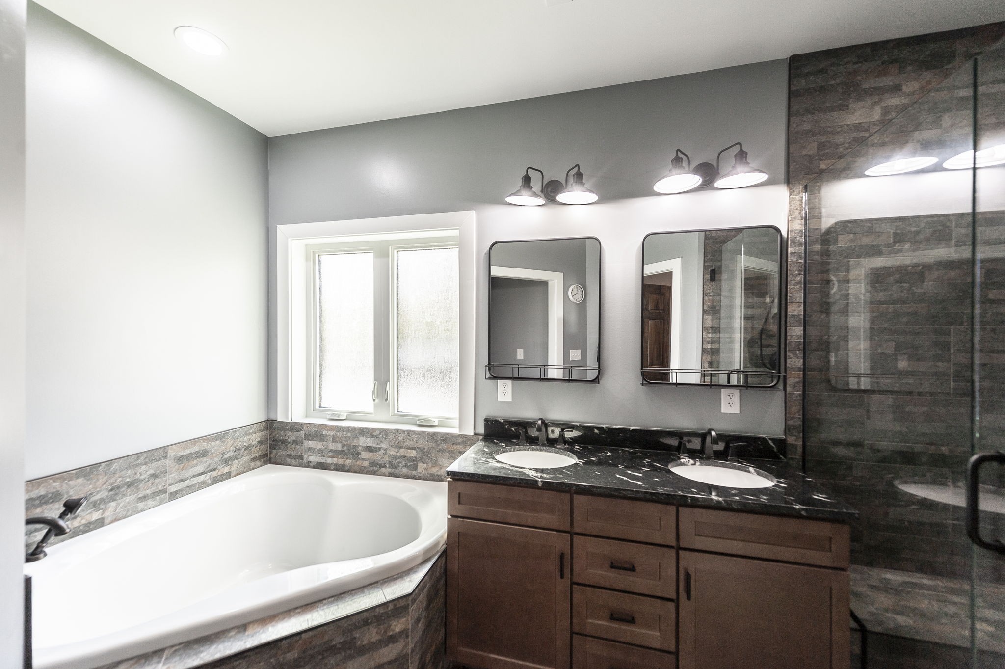 223 Cedar Hill Road Adams, TN 37010 - Photo 31 of 51 a bathroom with a double vanity sink mirror and bathtub