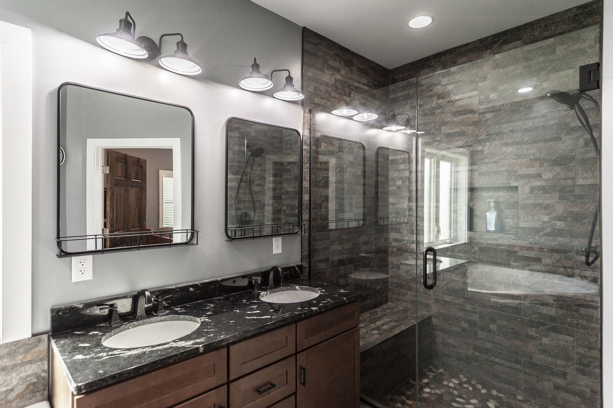 223 Cedar Hill Road Adams, TN 37010 - Photo 32 of 51 a bathroom with a granite countertop sink a mirror and shower