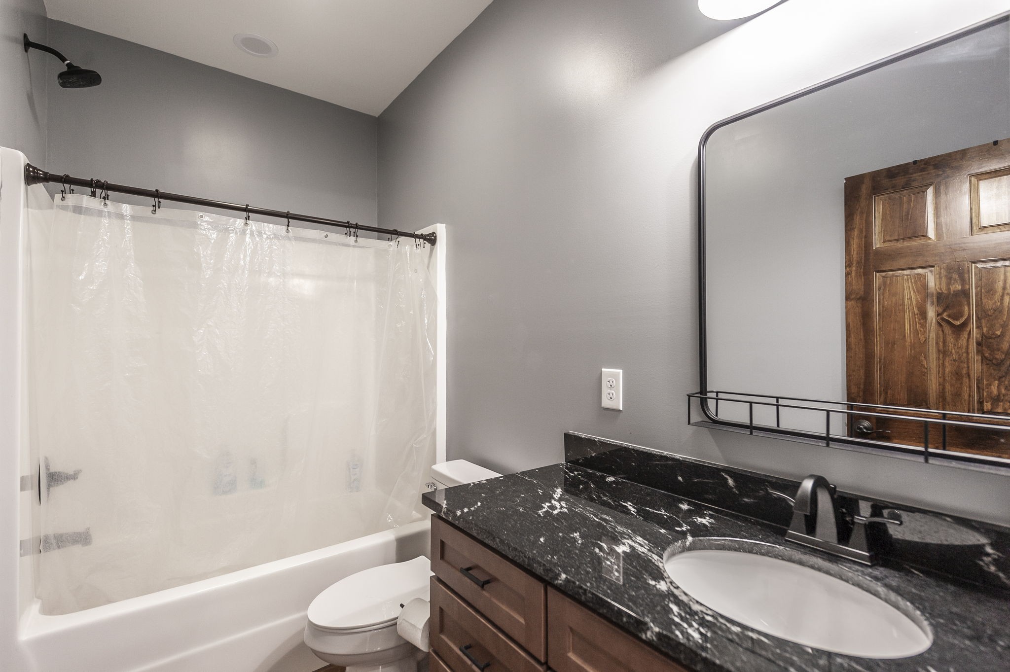 223 Cedar Hill Road Adams, TN 37010 - Photo 39 of 51 a bathroom with a granite countertop sink toilet and shower