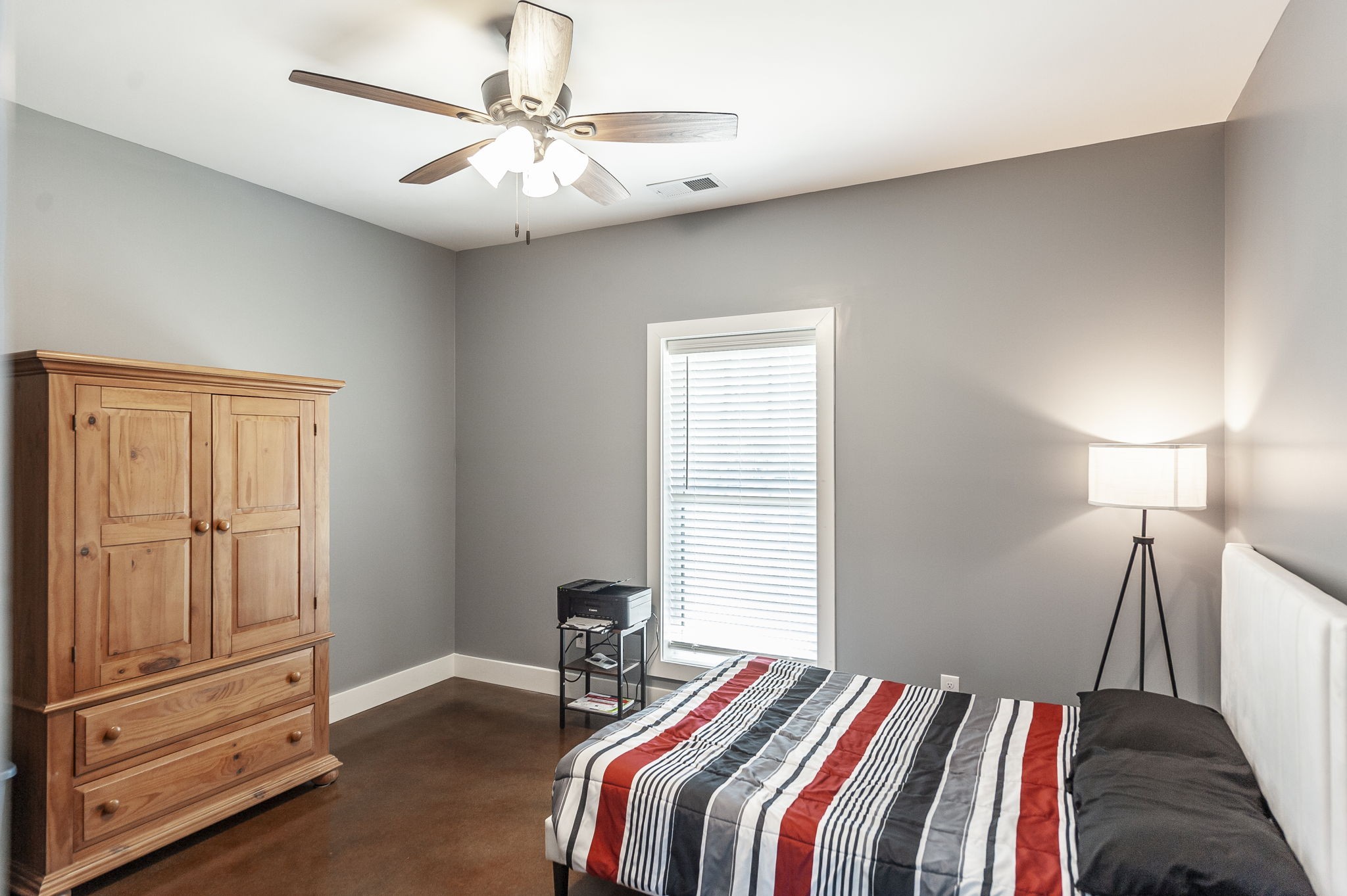 223 Cedar Hill Road Adams, TN 37010 - Photo 40 of 51 a bedroom with a bed and a chandelier