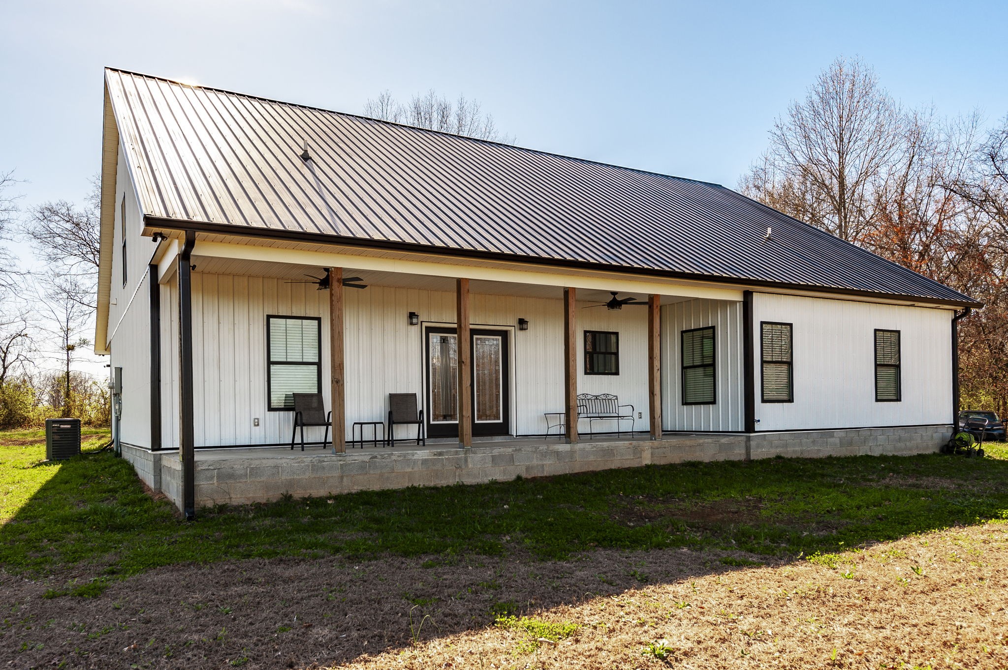 223 Cedar Hill Road Adams, TN 37010 - Photo 46 of 51 a front view of a house with a yard
