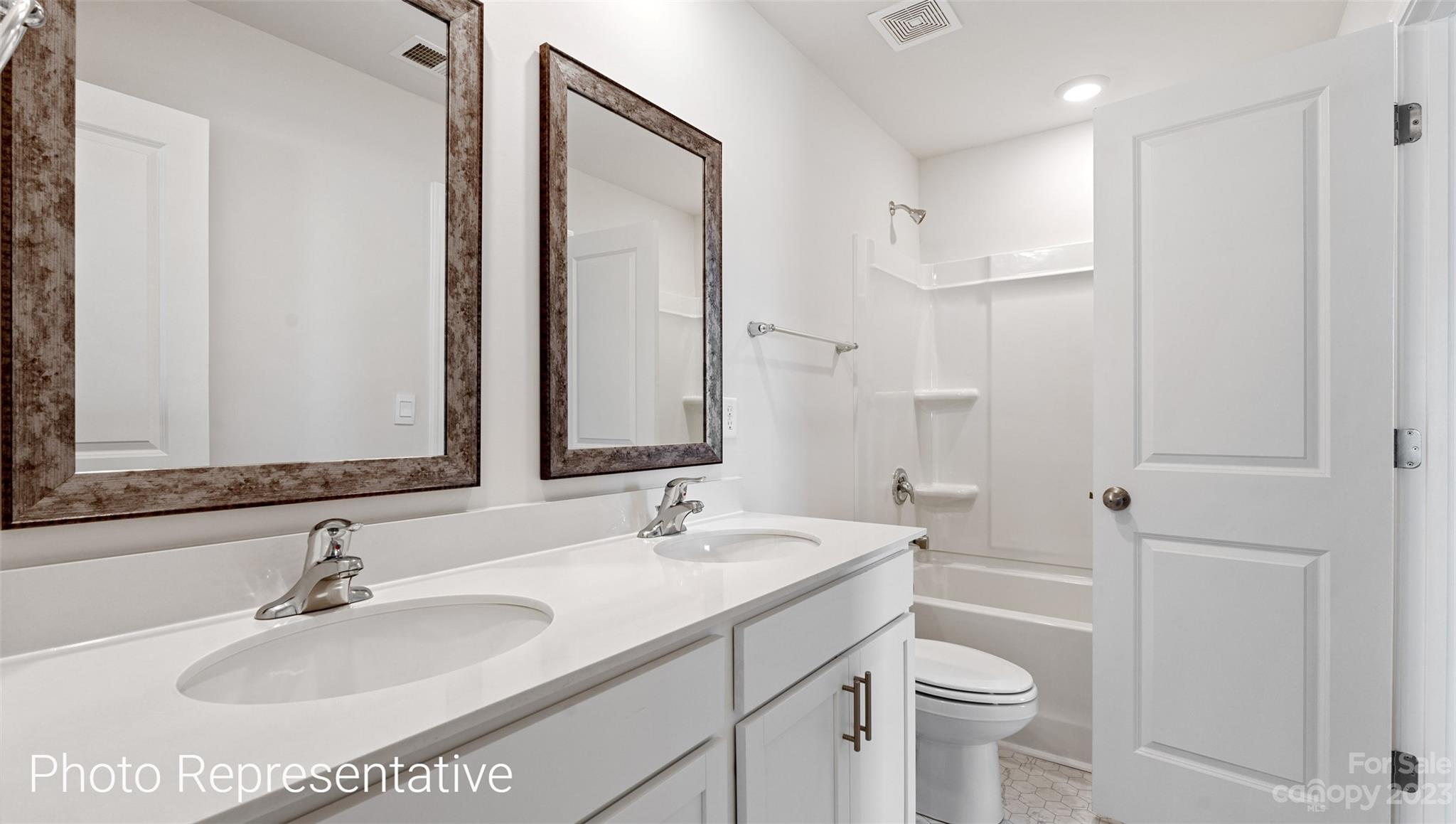 116 Wheatfield Road Fletcher, NC 28732 - Photo 23 of 29 a bathroom with a sink toilet and shower